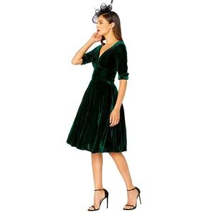 Unique Vintage Delores 1950’s emerald green velvet swing dress NWT